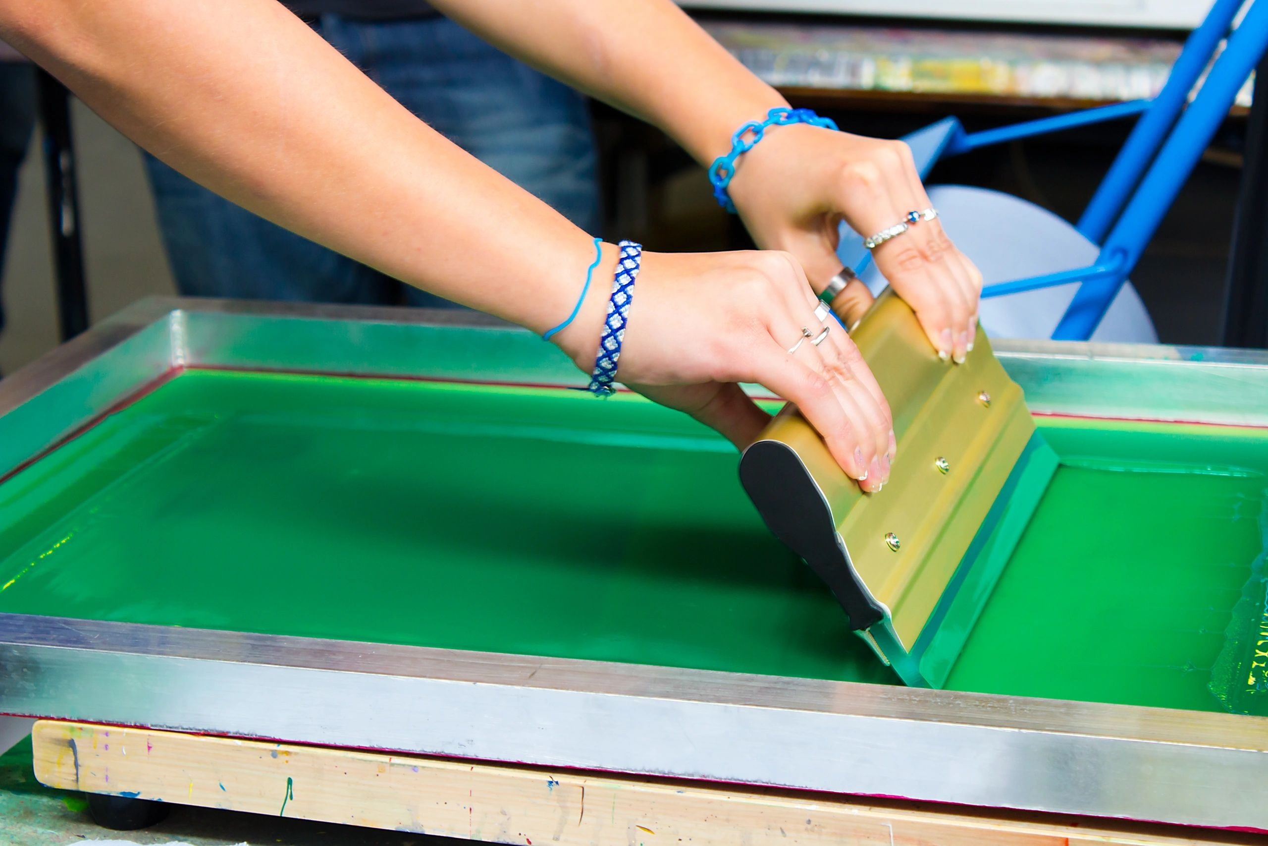 Commercial printing press and screen printing facility